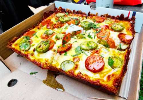 Delicious pizza of Detroit Pizza London
